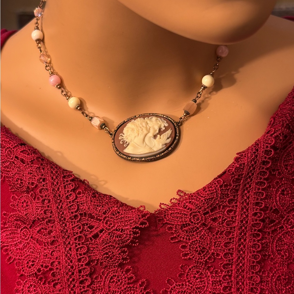 1928 featuring twin sisters with dove cameo pendant necklace